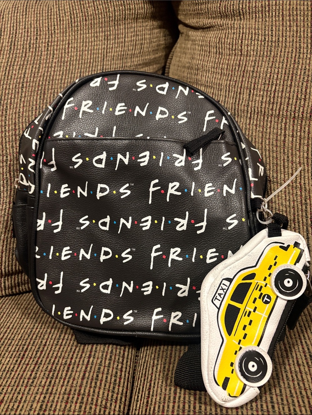 FRIENDS Black Mini Backpack with Multicolor Logo and Yellow Taxi Charm